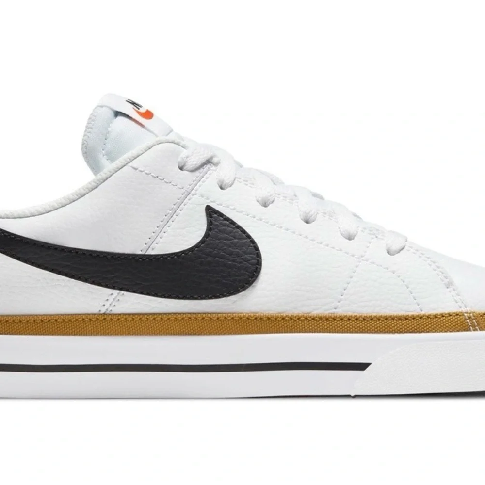 Nike White Sneakers with Black Swoosh and Gold Accent - Picture 2 of 7